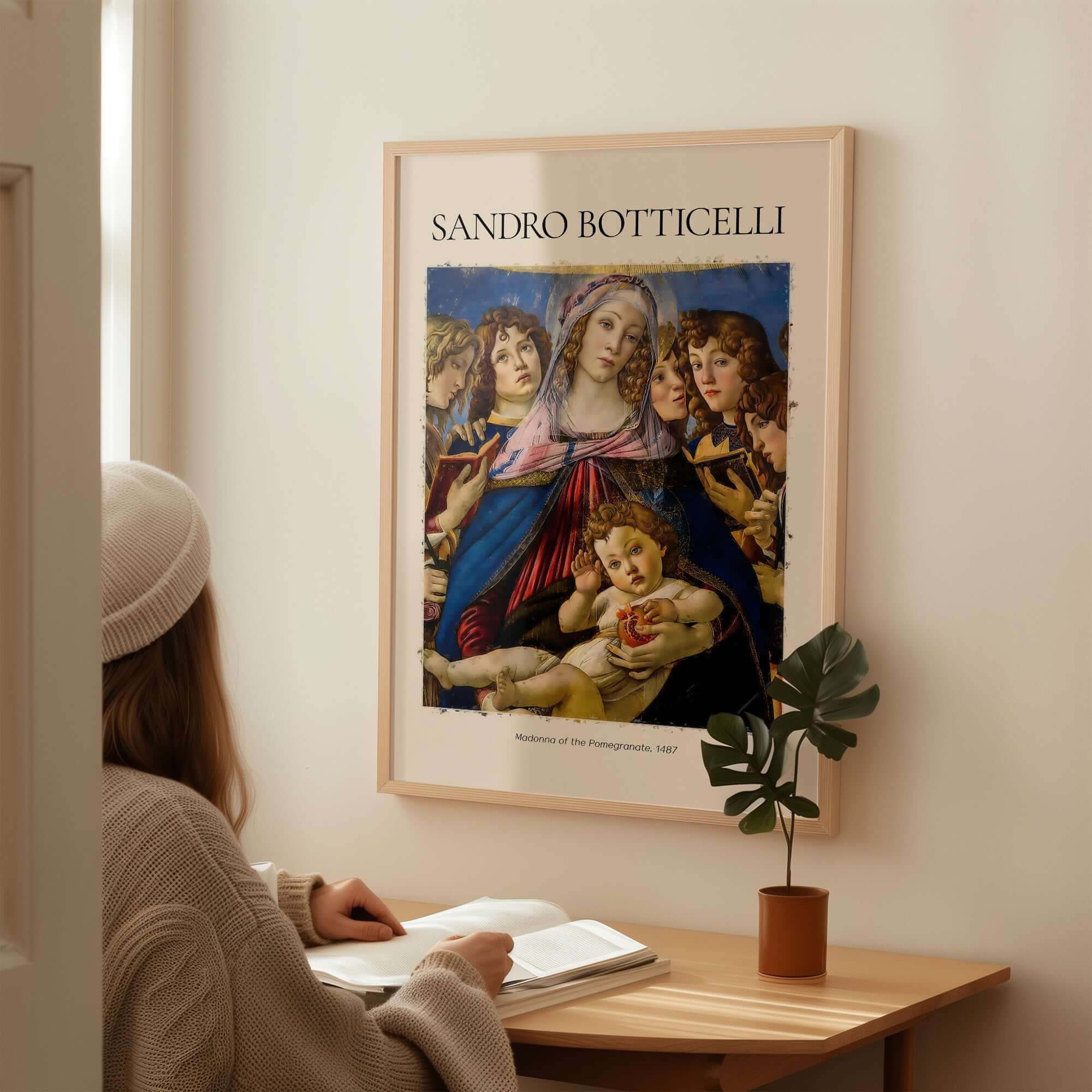 Botticelli Madonna of the Pomegranate Art Print Religious Virgin Mary Child Poster Angels on a wall with a viewer.
