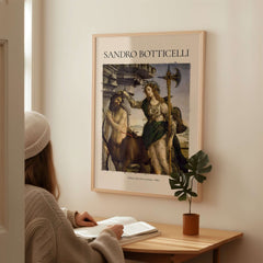 A person admiring the Botticelli Pallas and the Centaur Minerva Art Print Mythology Allegory Poster on the wall.