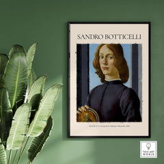 Botticelli Portrait of a Young Man Roundel 1480 Art Print Renaissance Florentine Poster framed on a wall.