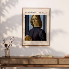 Botticelli Portrait of a Young Man Roundel 1480 Art Print Renaissance Florentine Poster displayed on a wall.