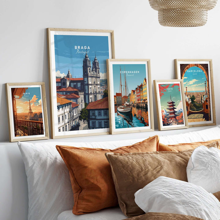 Braga Print | Portuguese Wall Decor displayed among other city prints in stylish frames on a cozy couch.