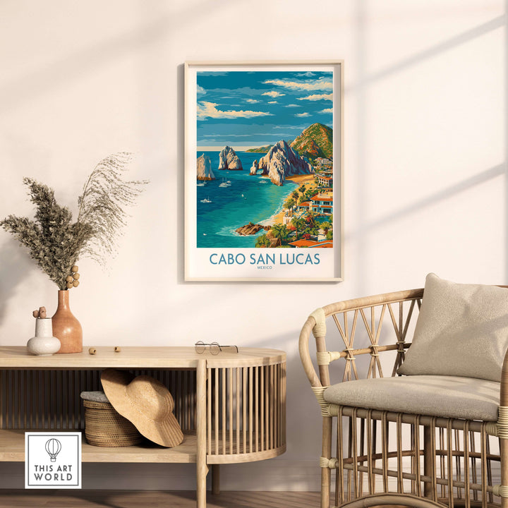 Cabo San Lucas coastline travel poster on wall, showcasing beach hotels and vibrant blue sea view.