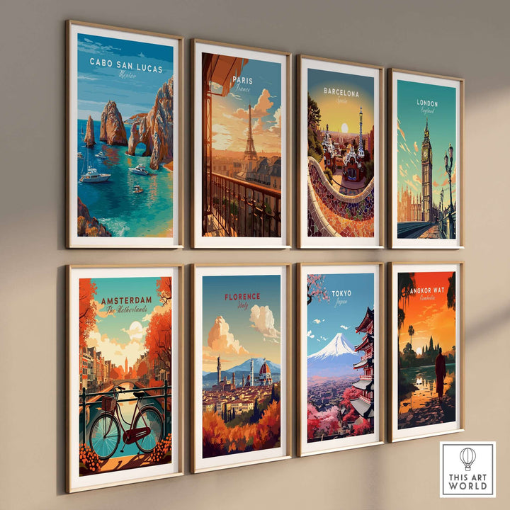 Gallery wall featuring travel posters of Cabo San Lucas, Paris, Barcelona, London, Amsterdam, Florence, Tokyo, and Angkor Wat.