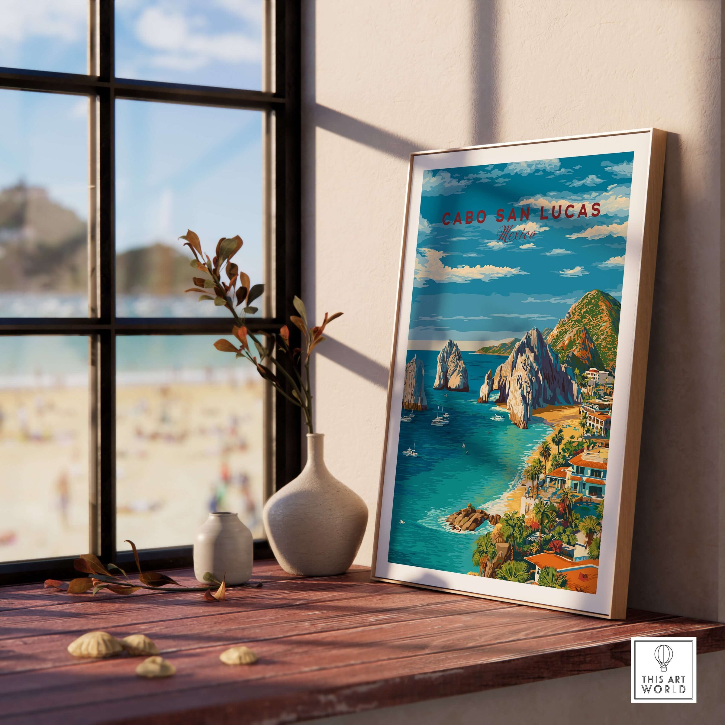 Cabo San Lucas Mexico Travel Print Coastal Town Beach Resorts Poster Wall Art displayed in a sunny room with a beach view.