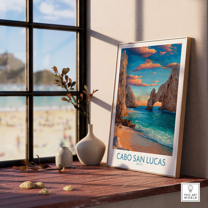 El Arco Cabo San Lucas sunset poster displayed indoors, highlighting coastal landscape and vibrant colors.