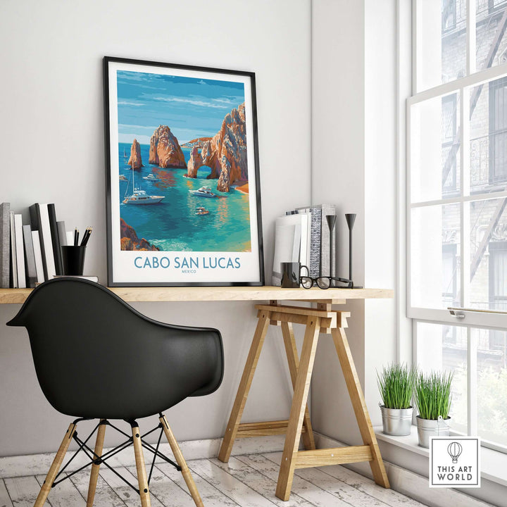 Cabo San Lucas travel poster featuring El Arco and boats on turquoise water, displayed in a modern interior setting.
