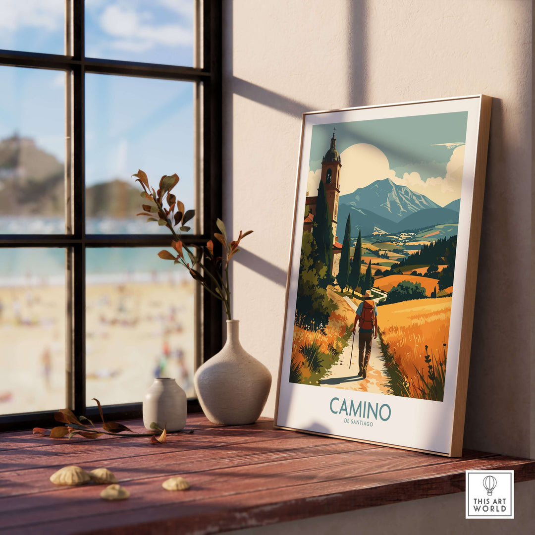 Camino de Santiago Golden Fields Art Print | Spanish Pilgrimage Poster displayed in a cozy interior setting with a view.
