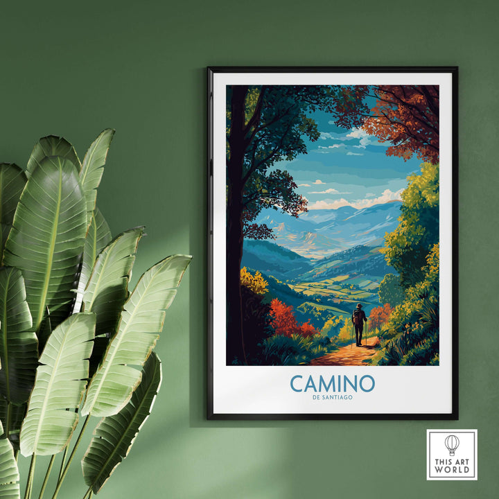 Camino de Santiago Mountain Valley Art Print | Scenic Hiking Poster framed on a wall with greenery around.
