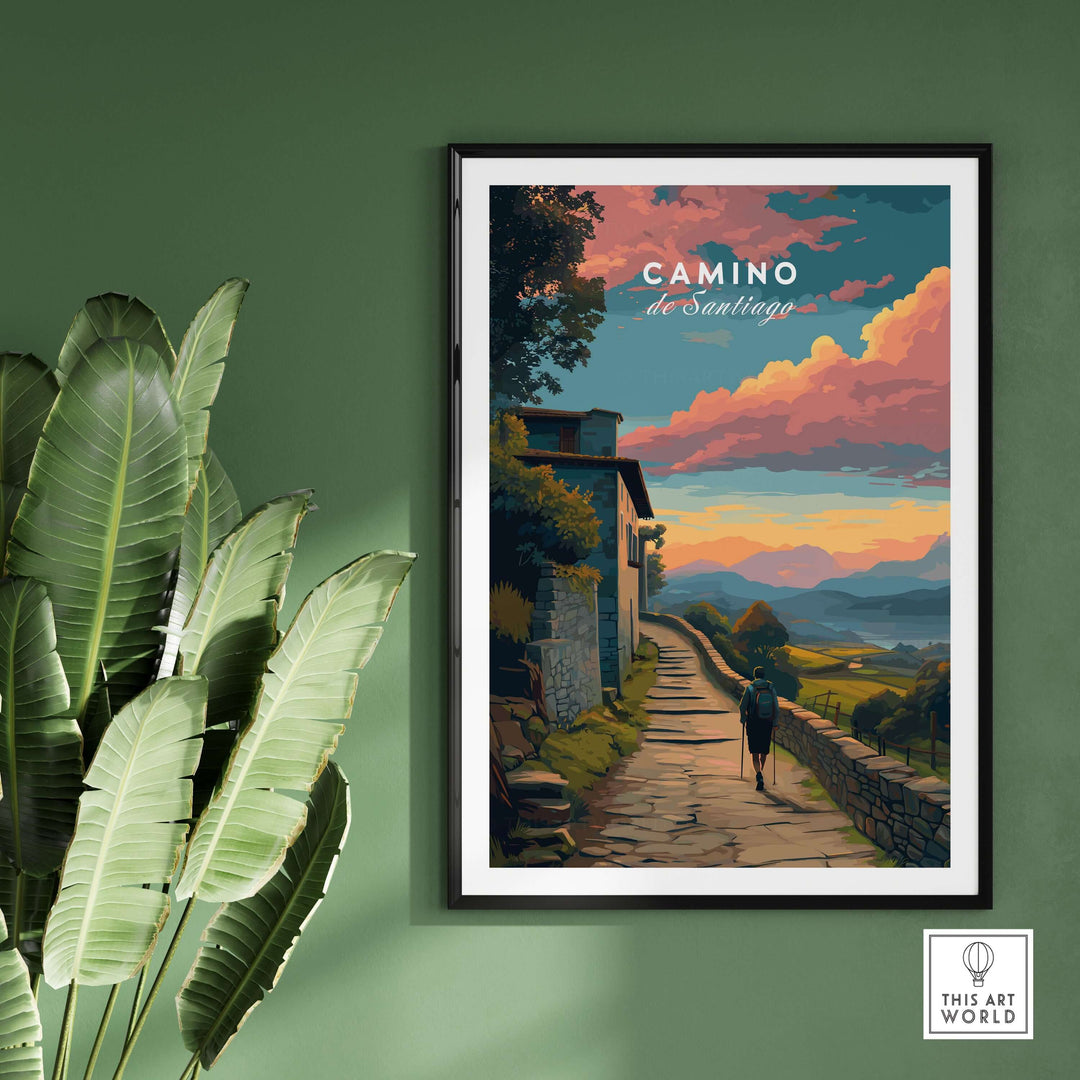 Camino de Santiago Sunset Path Print | Hiking Wall Decor Gift framed on a green wall with plants and sunset scenery.