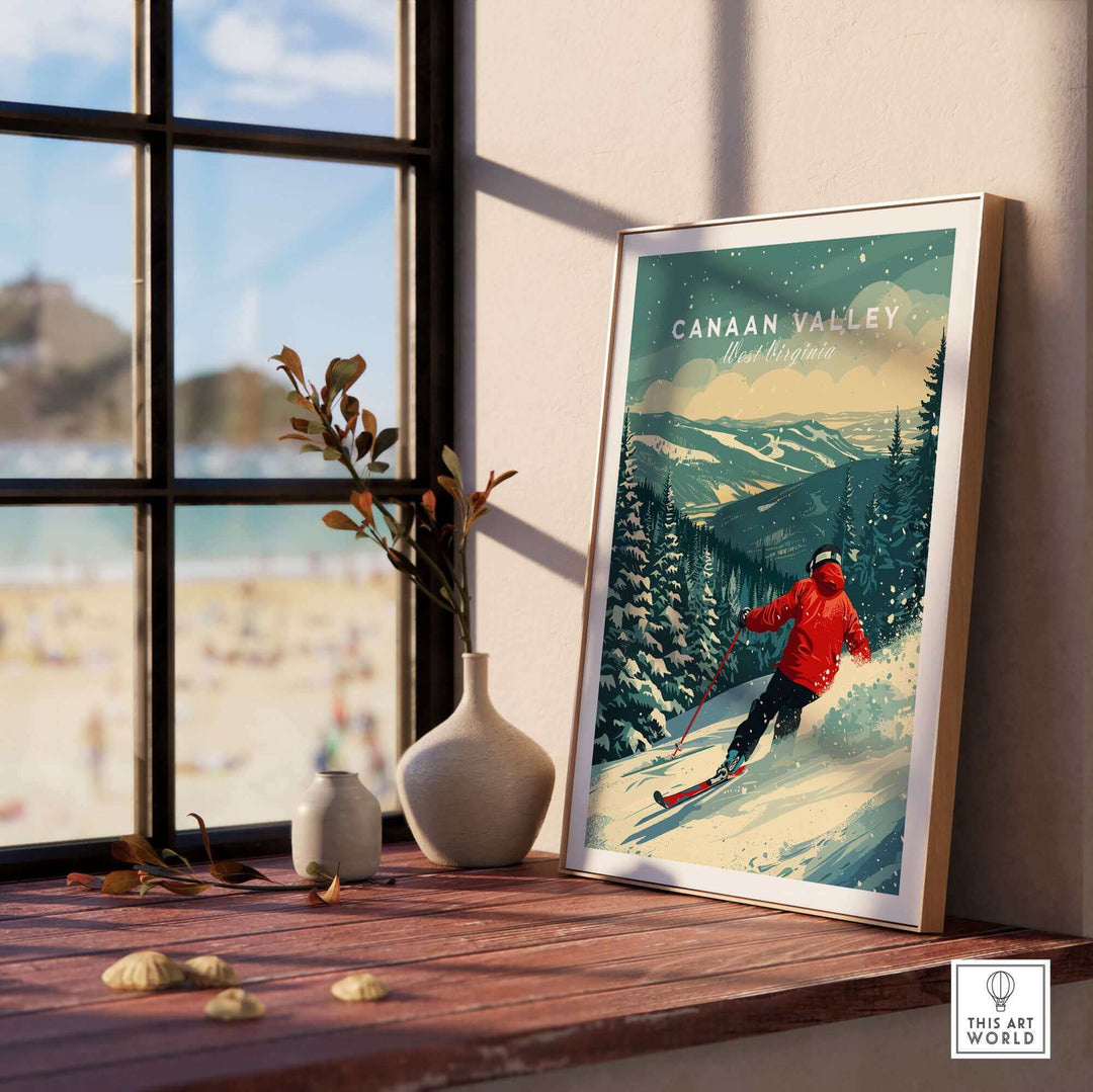 Canaan Valley travel poster showcasing a skier on snowy slopes, framed on a table with a sunny outdoor view.