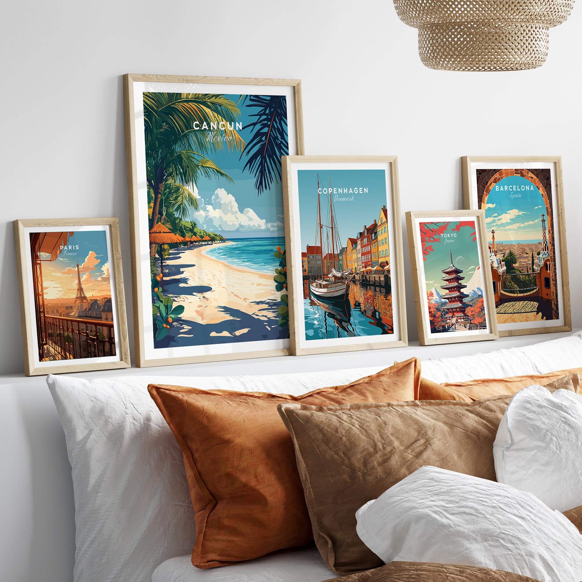 Cancun Print travel poster displayed among other city posters in a stylish home decor setting.