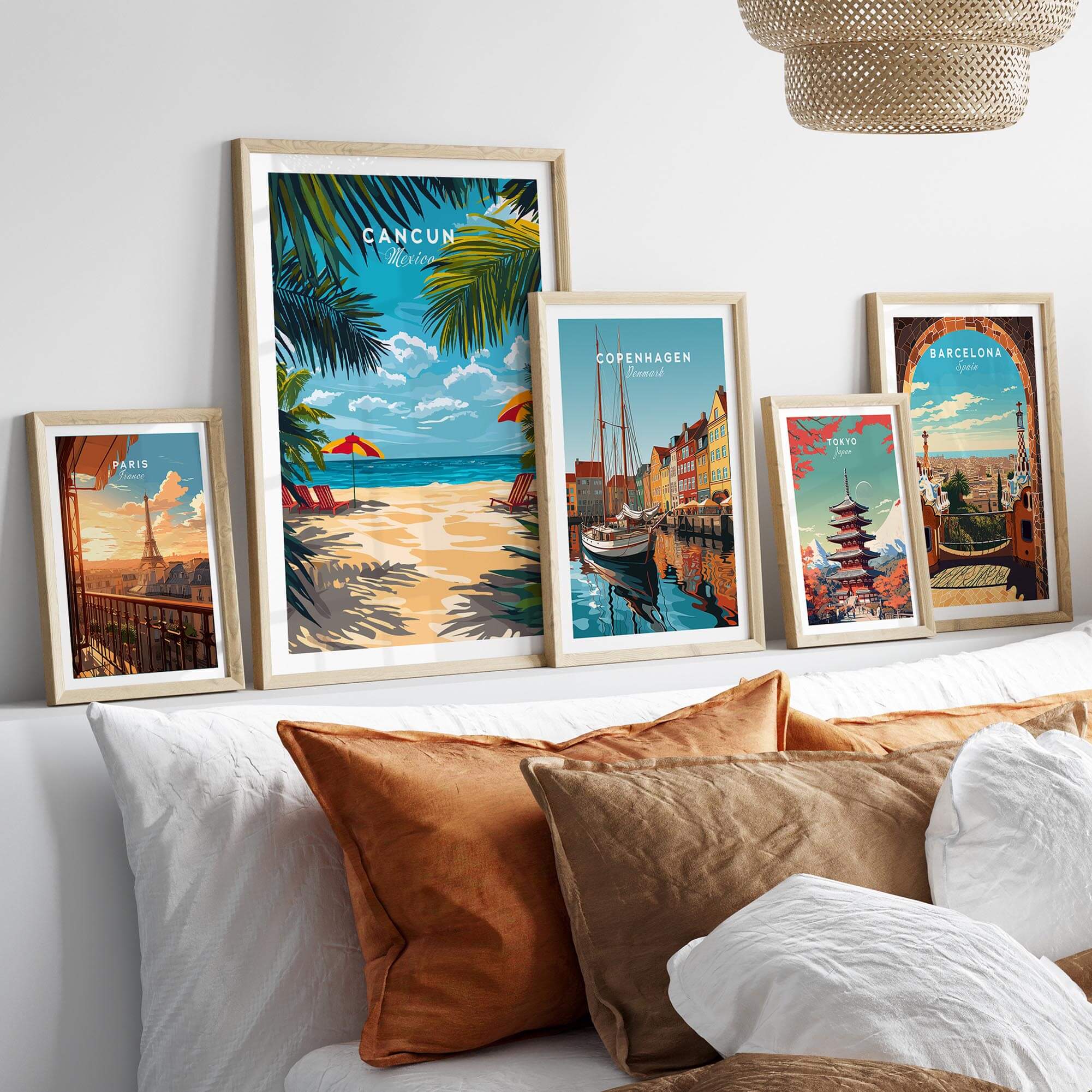 Wall featuring Cancun Travel Print and other city poster prints in colorful frames.