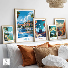 Cannes Travel Poster displayed among other travel prints in a stylish living room setting.