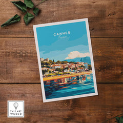 Cannes Wall Art featuring a vibrant illustration of the iconic city of Cannes, France on a serene waterfront.