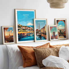 Cannes Wall Art displayed on a modern wall, featuring vibrant depictions of Cannes and other cities.