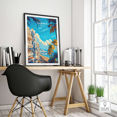 Cannes Wall Art Poster framed and displayed on a wall above a desk in a modern workspace.