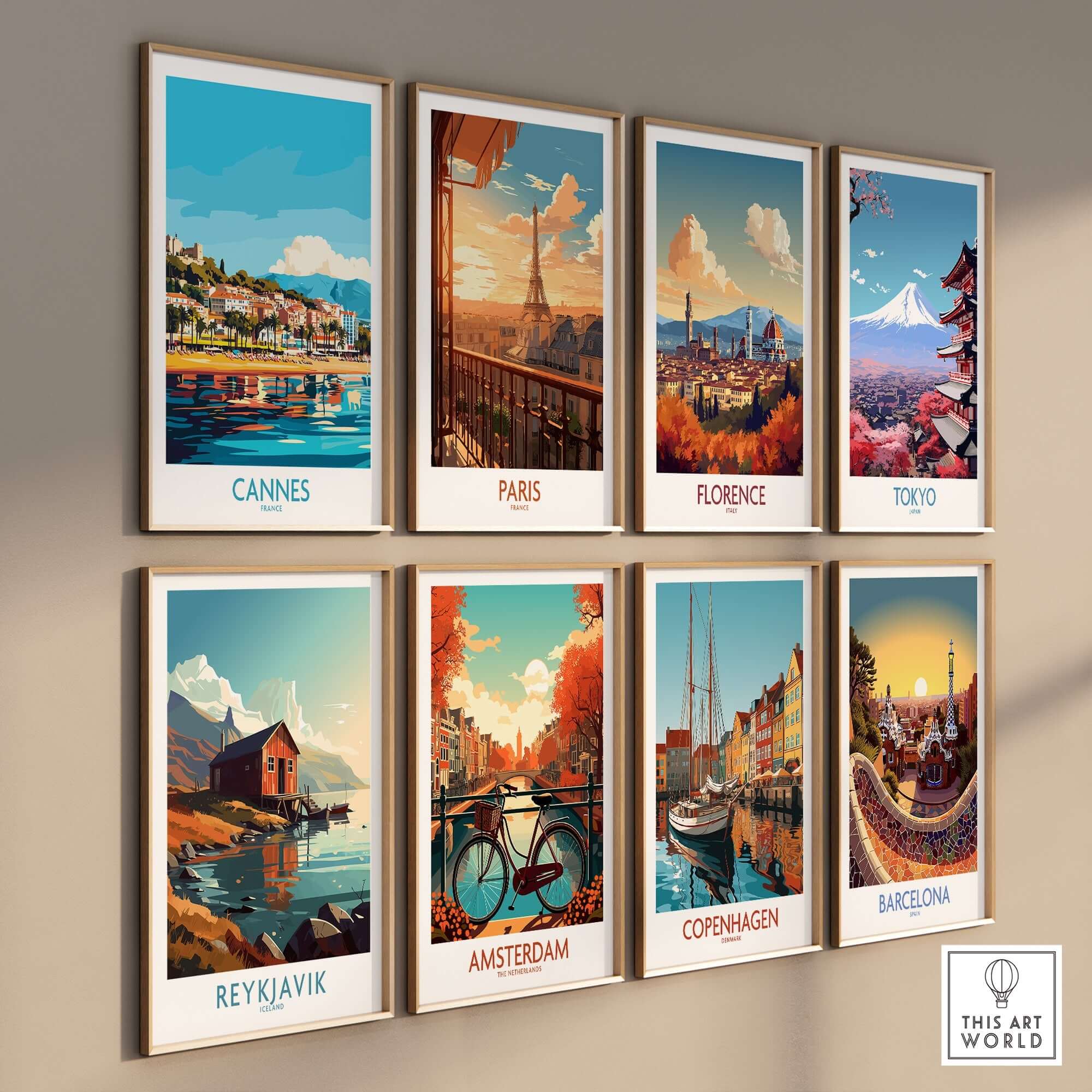 Cannes Wall Art Print and travel posters of famous cities displayed in stylish frames on a wall.