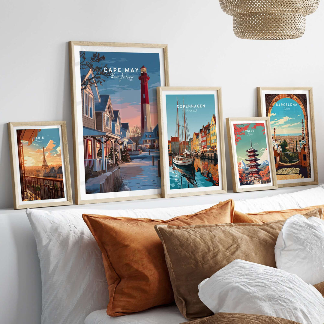 Beautiful Cape May New Jersey Christmas Lights wall art prints displayed in stylish frames on a cozy bed.