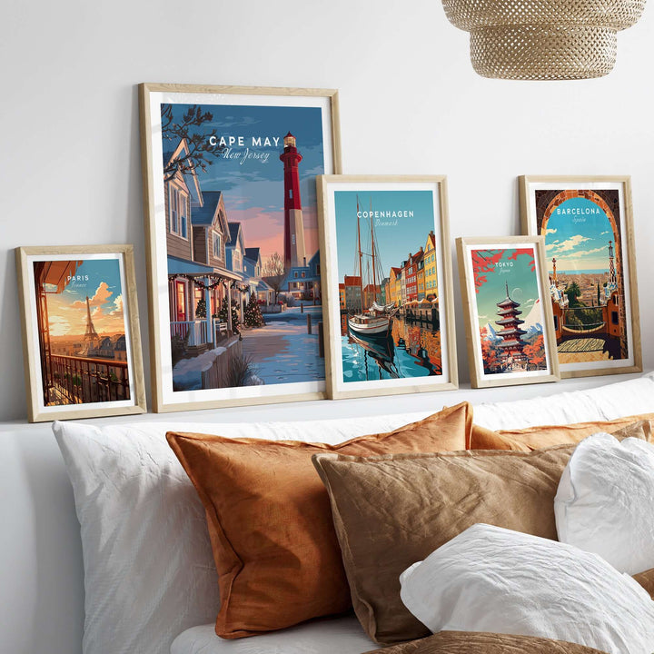 Beautiful Cape May New Jersey Christmas Lights wall art prints displayed in stylish frames on a cozy bed.