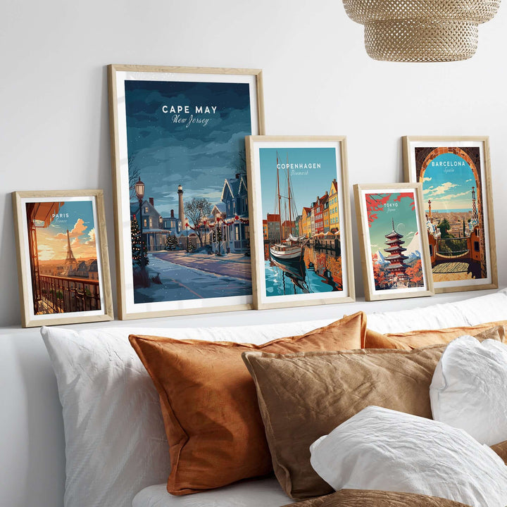 Cape May New Jersey winter scene print displayed on a wall with other travel-themed art, ideal for festive holiday decor.