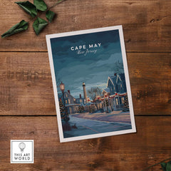 Cape May New Jersey Winter Scene Print - Festive Holiday Wall Art displayed on wooden table with holiday decorations