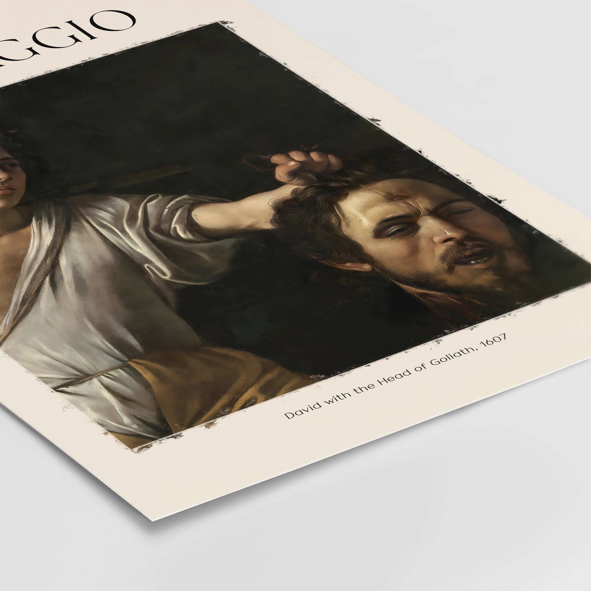 Caravaggio Art Print - David with the Head of Goliath Poster 1607 displayed on a wall.
