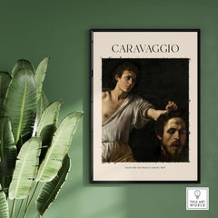 Caravaggio Art Print - David with the Head of Goliath Poster 1607 framed art print displayed on a green wall.