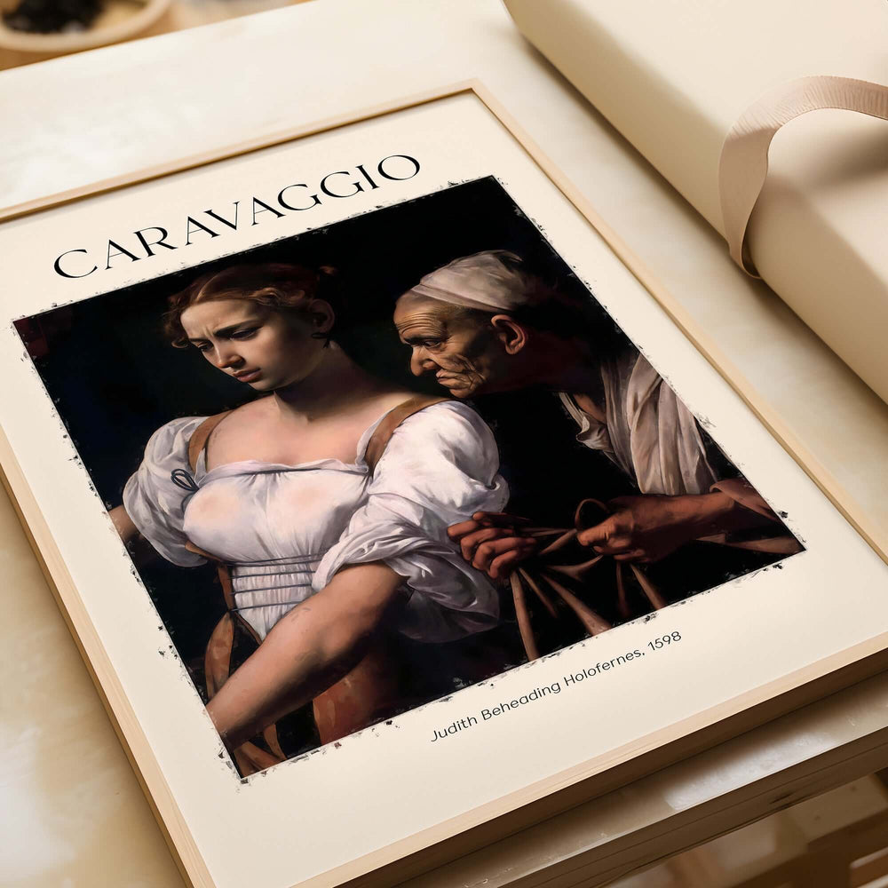 Caravaggio Art Print - Judith Beheading Holofernes Poster 1598 displayed in a stylish frame.