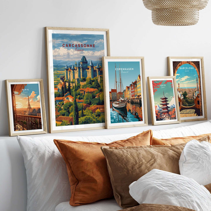Framed Carcassonne medieval castle poster with travel art, decor on a cozy bed with decorative pillows.