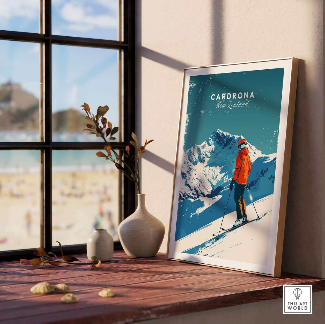 Cardrona travel poster featuring a skier in vibrant orange, showcasing New Zealand's stunning ski resort scene.