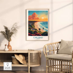 Carlsbad Travel Poster featuring a beautiful sunset and coastal view in a stylish interior setting.