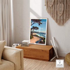 Carmel-by-the-Sea Poster Print displayed in a cozy living room setting, showcasing California's coastal beauty.