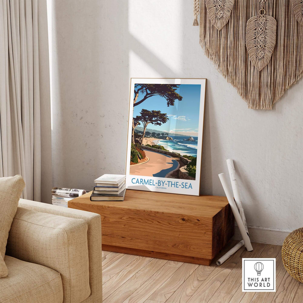 Carmel-by-the-Sea Wall Art Print displayed in a cozy living room setting with beach scenery.