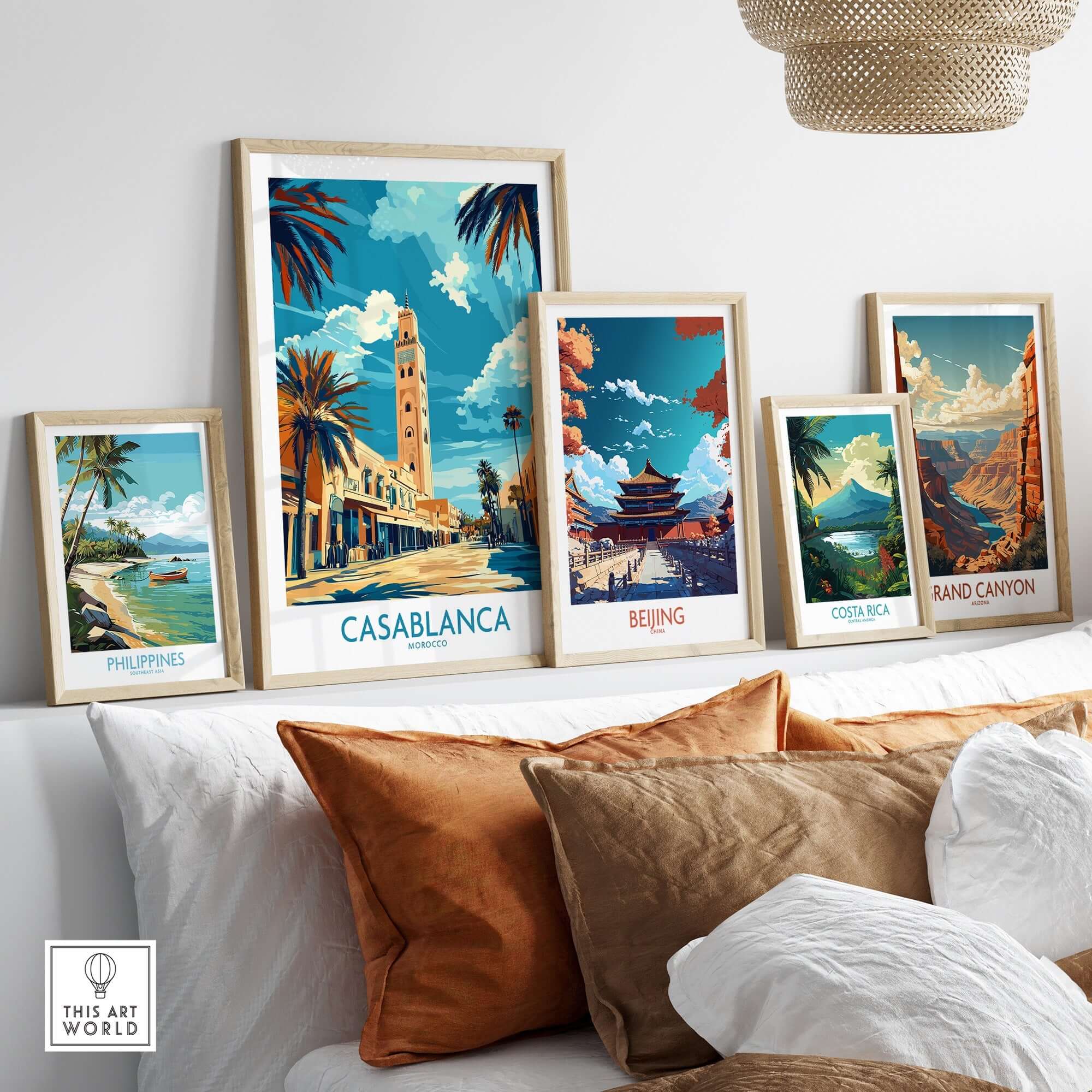 Casablanca Poster displayed among other travel posters on a stylish couch, showcasing vibrant city illustrations.