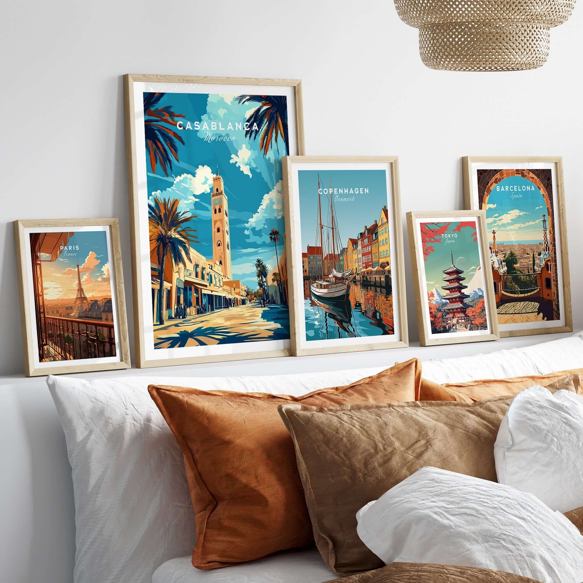 Casablanca Print showcased among other travel-themed prints on a stylish bed, enhancing home decor.