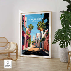 Casablanca Wall Art Print framed in a bright room with palm trees and a colorful street scene.