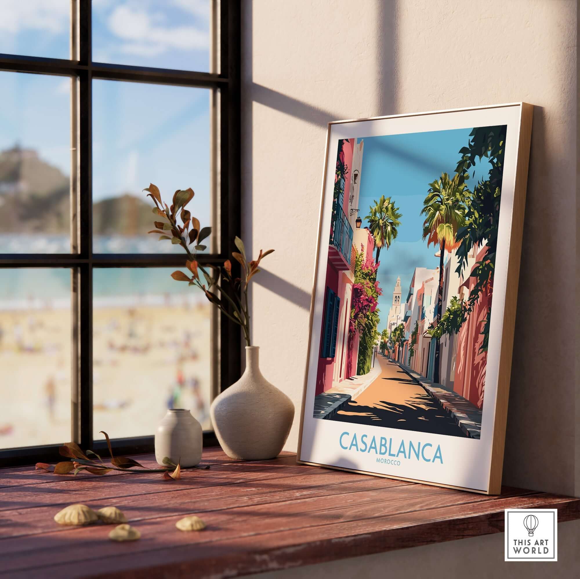 Casablanca Wall Art Print displayed on a table near a window with a beach view, capturing the essence of the iconic city.