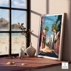 Casablanca Wall Art Print displayed in a bright room with sunny beach view and decorative plants.