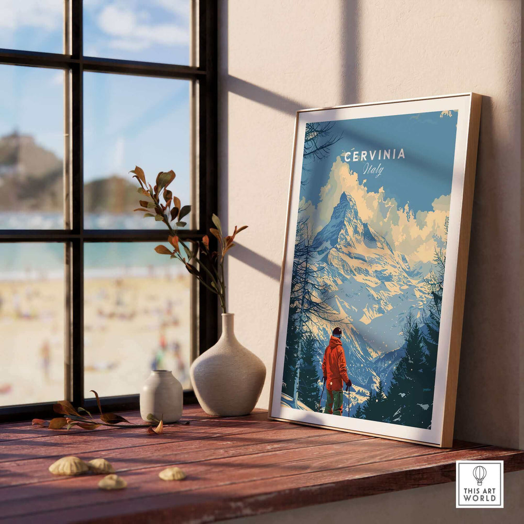 Cervinia ski print showcasing majestic mountains in Italy, framed and displayed in a sunlit room with a beach view.