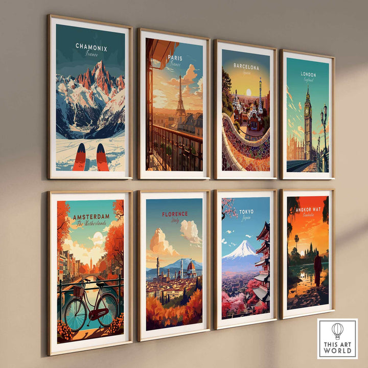 Gallery wall with travel posters featuring Chamonix, Paris, Barcelona, London, Amsterdam, Florence, Tokyo, and Angkor Wat.