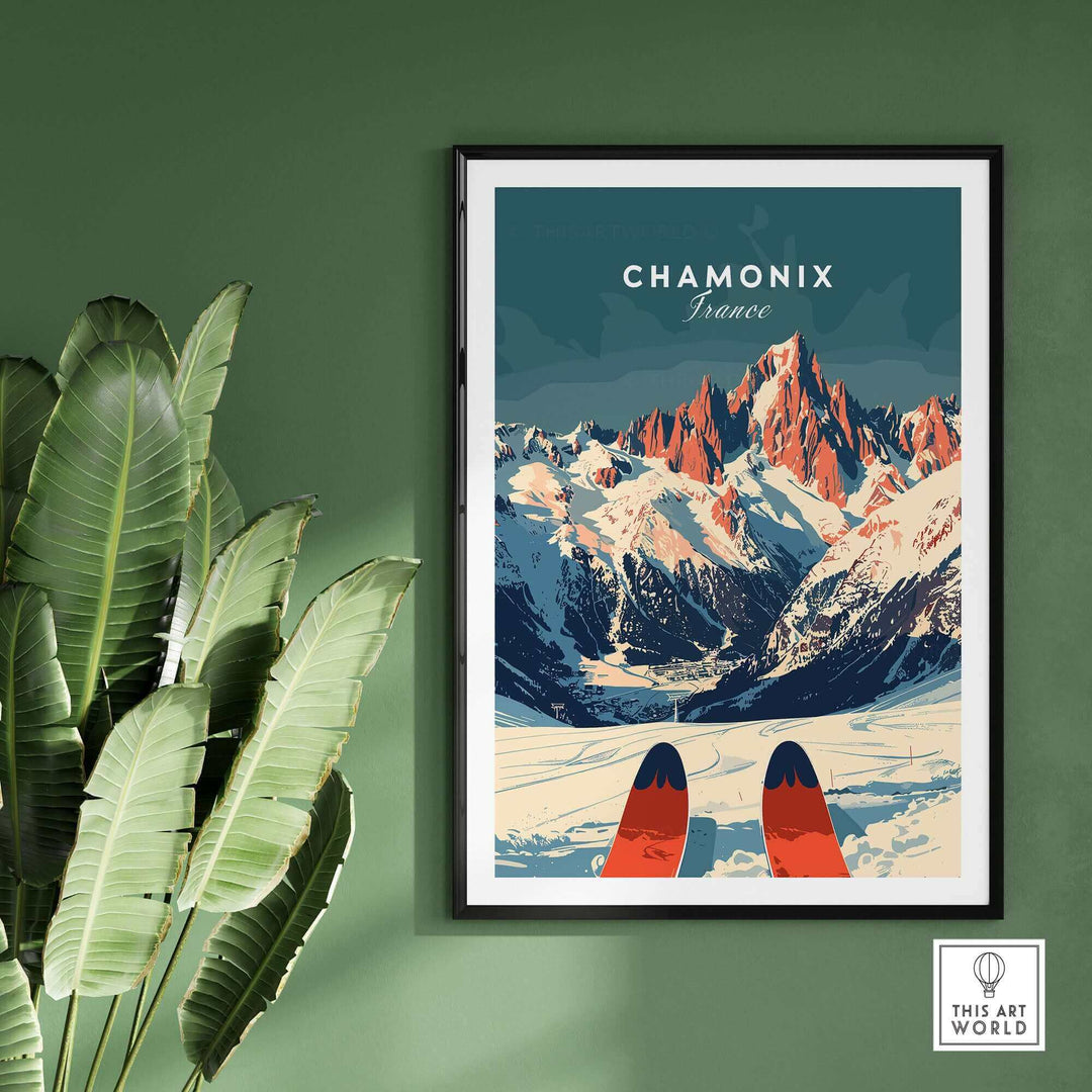 Chamonix Ski Poster featuring French Alps scenery with ski tips, framed and displayed on a green wall beside leafy plants.