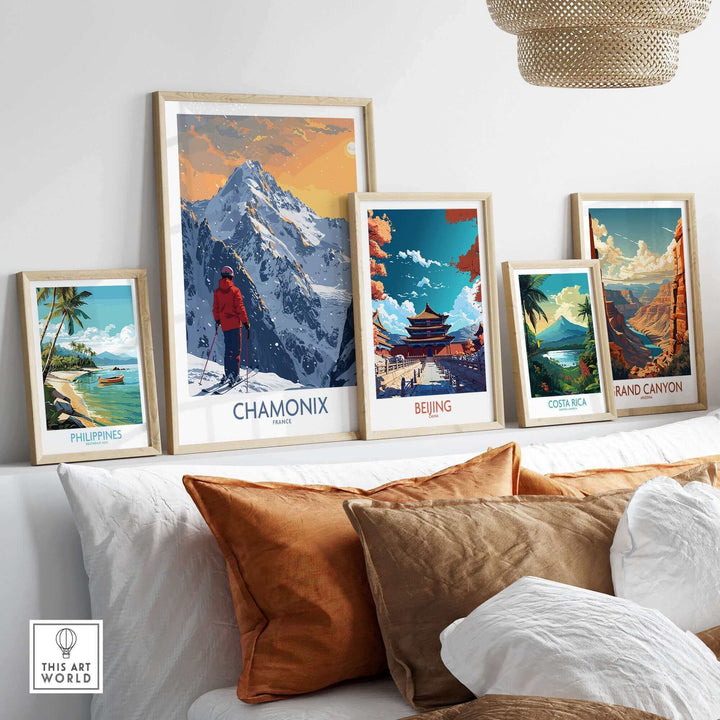 Framed travel prints showcasing Chamonix, Beijing, Costa Rica, the Grand Canyon, and the Philippines displayed in a cozy living room setting.