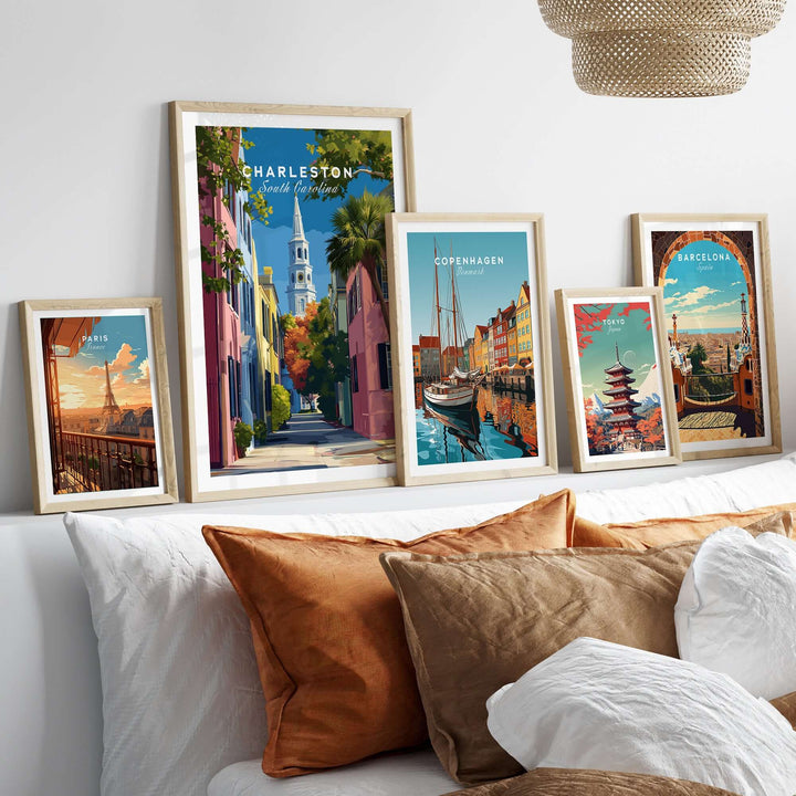 Charleston St. Philip's Steeple View Print | South Carolina Home Decor displayed among framed artwork on a stylish bed.