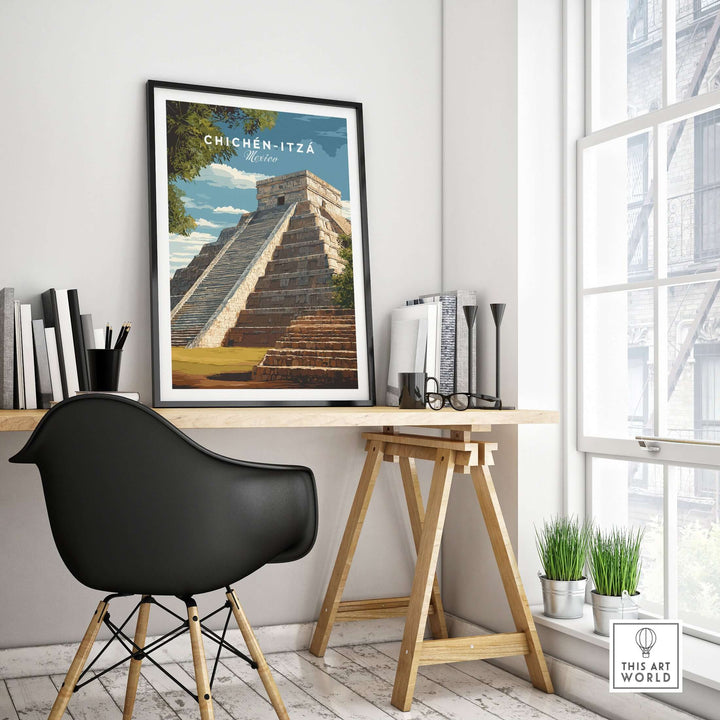 Chichén Itzá travel print of El Castillo pyramid framed in a modern workspace with a stylish chair and natural light.