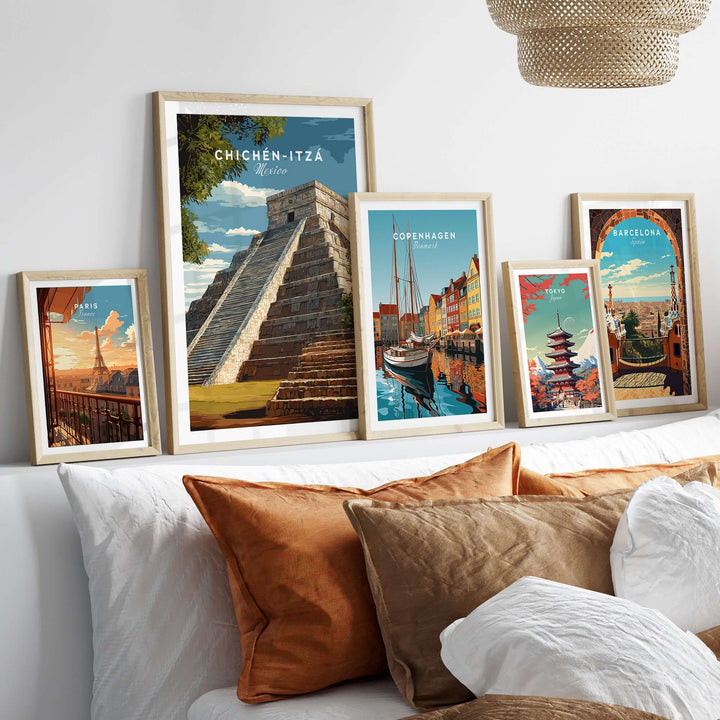 Chichén Itzá Mexico travel print featuring El Castillo pyramid displayed with other travel posters on a cozy sofa.