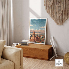 Cochabamba Travel Print Bolivia Wall Art displayed in a cozy living room setting with warm tones and natural decor.