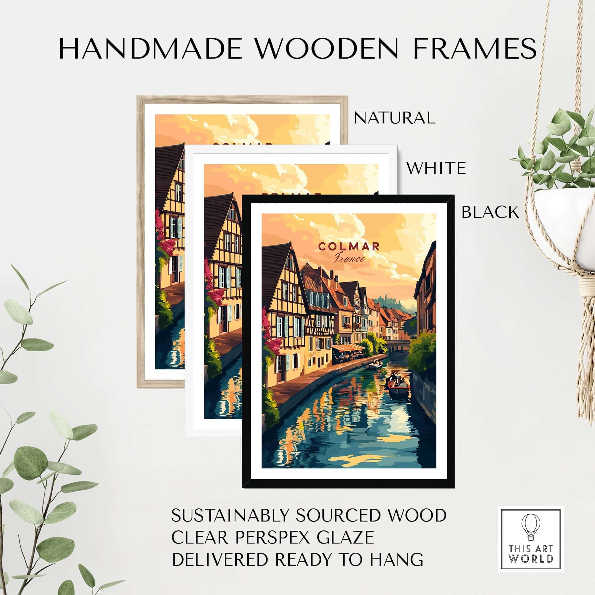 Colmar Art Print displayed in three handmade wooden frames: natural, white, and black, ready to hang.