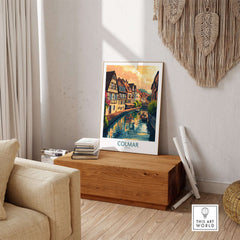 Colmar Print travel poster showing colorful buildings by a canal in Colmar, France, perfect for home or office decor.
