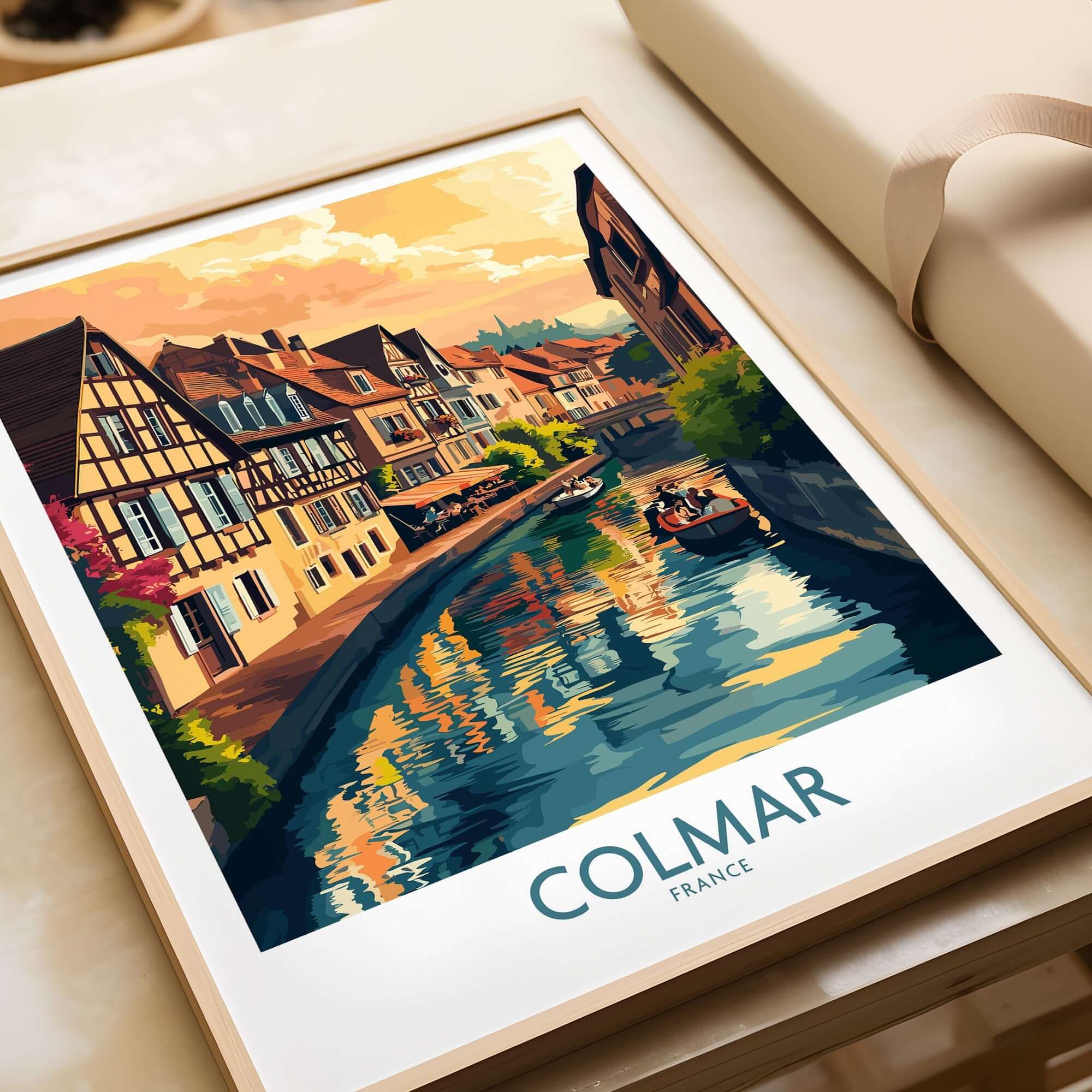 Colmar Print of a picturesque canal scene in Colmar, France, featuring charming houses and boats.