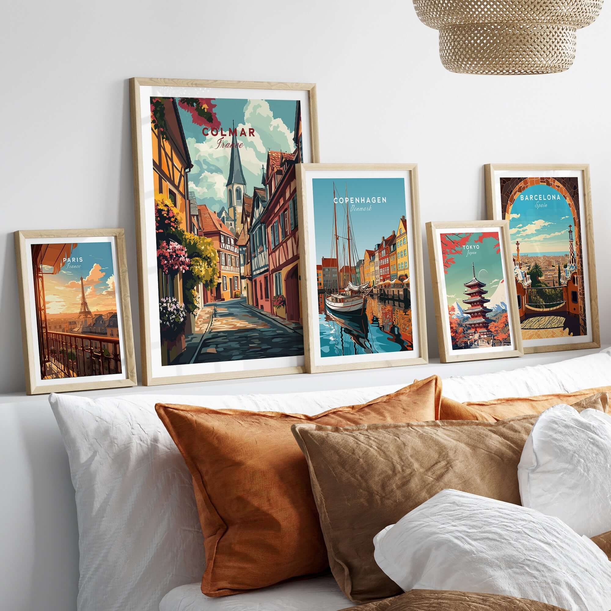 Colmar Wall Art featuring vibrant travel prints in a stylish home setting with framed artwork.